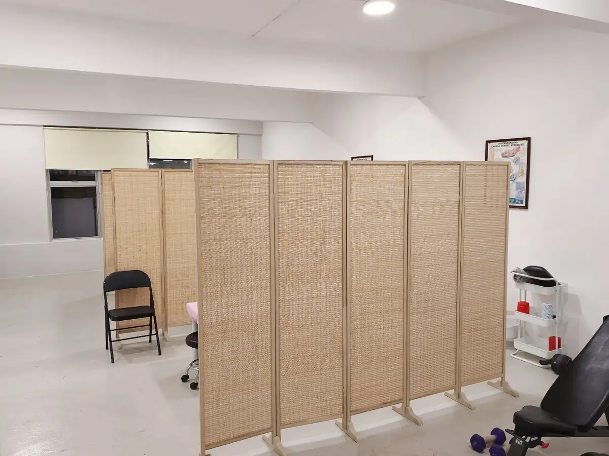 Treatment areas separated by privacy partitions at Armos Therapy