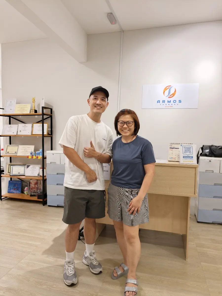 Winston with a patient at the Armos reception area